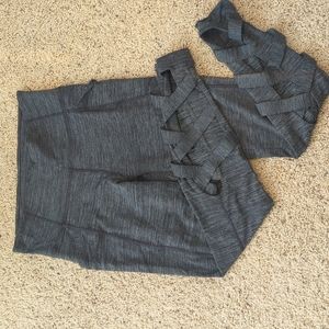 Grey athleta leggings with criss cross cutout design size M